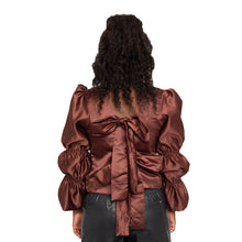 Load image into Gallery viewer, Description  100% poly Satin fabric Made in Sierra Leone  Dry clean only Fully Lined Puff sleeves Back tie closure  Flared sleeves Turtleneck  Color - brown Size &amp; fit  Modeled in size   Model measurement:   FOFIE - BLOUSE Size Bust Length Sleeve length XS	31	17	24 S	33	18	21 M	35	24	26 L	40	25	26 XL	42	26	26
