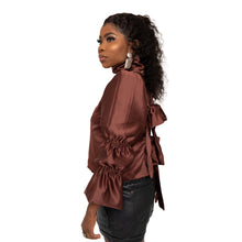 Load image into Gallery viewer, Description  100% poly Satin fabric Made in Sierra Leone  Dry clean only Fully Lined Puff sleeves Back tie closure  Flared sleeves Turtleneck  Color - brown Size &amp; fit  Modeled in size   Model measurement:   FOFIE - BLOUSE Size Bust Length Sleeve length XS	31	17	24 S	33	18	21 M	35	24	26 L	40	25	26 XL	42	26	26
