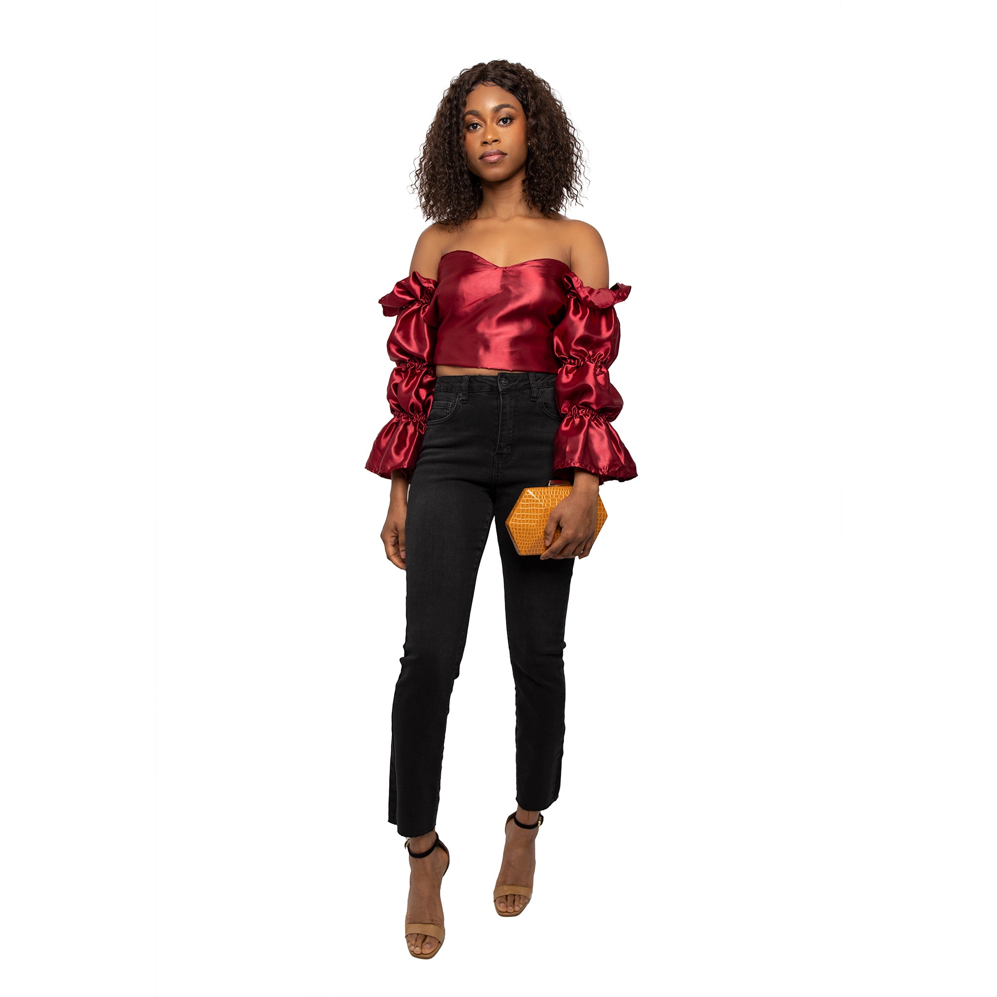 Burgundy puff sleeve with flared arms top. Open back tied closure.