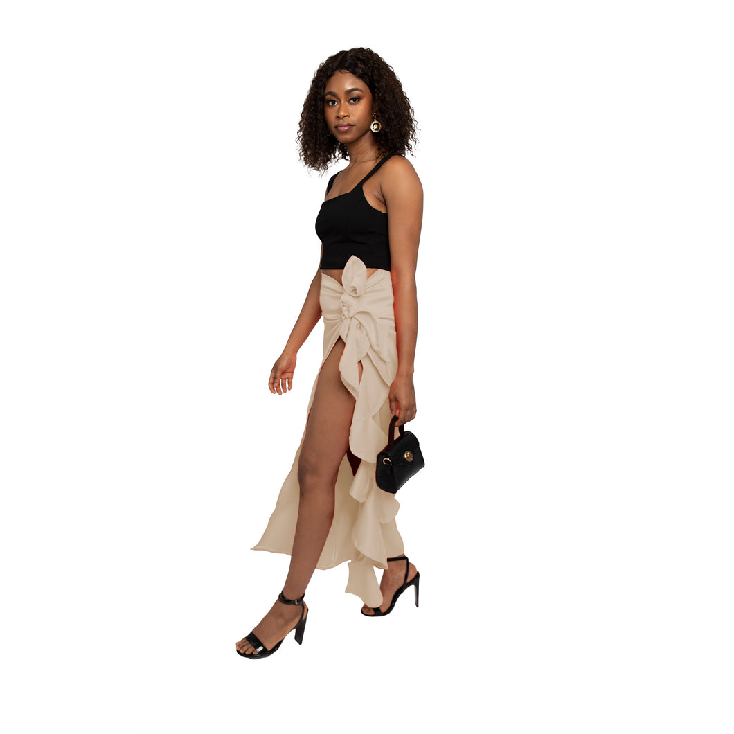 Long slit beige skirt with ruffles